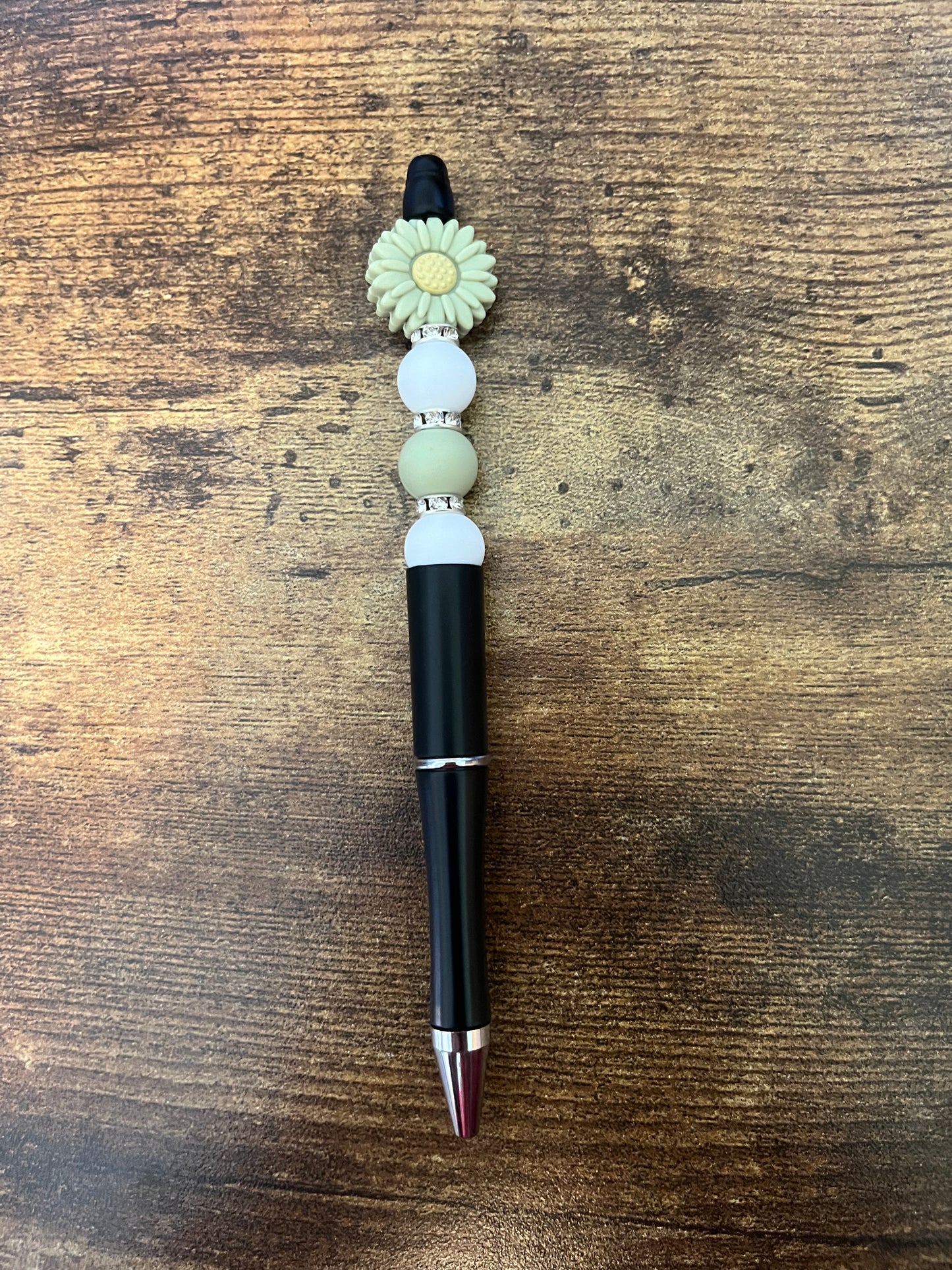 Green daisy pen