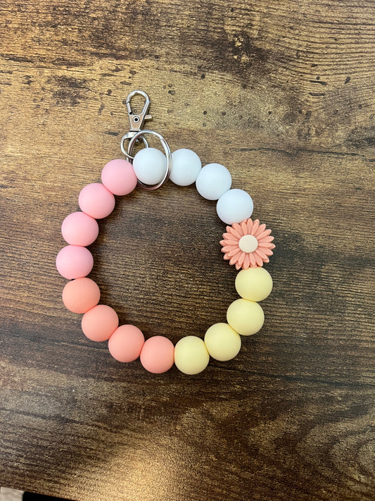 Pink daisy wristlet keychain