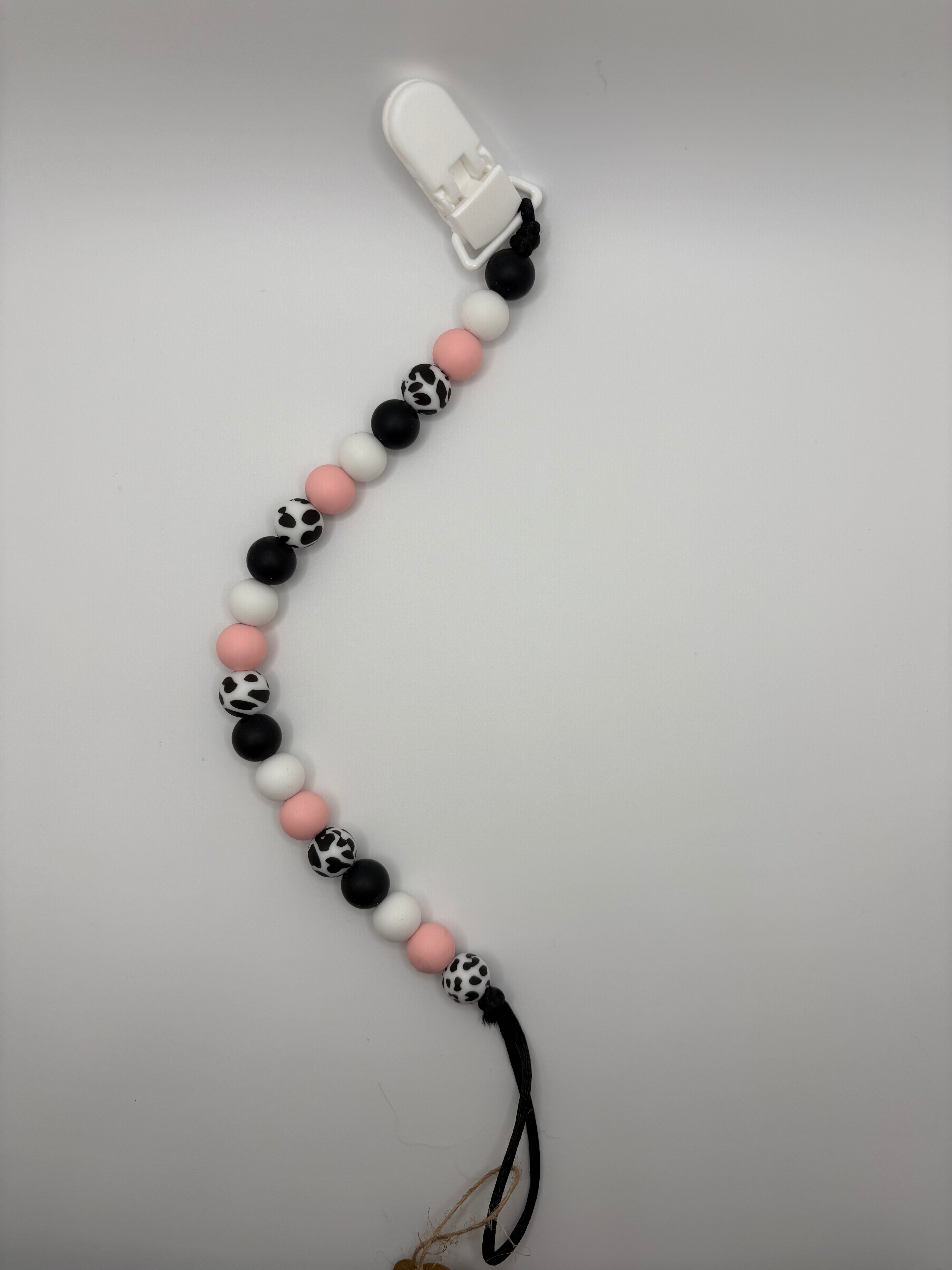 pink cow print binky clip