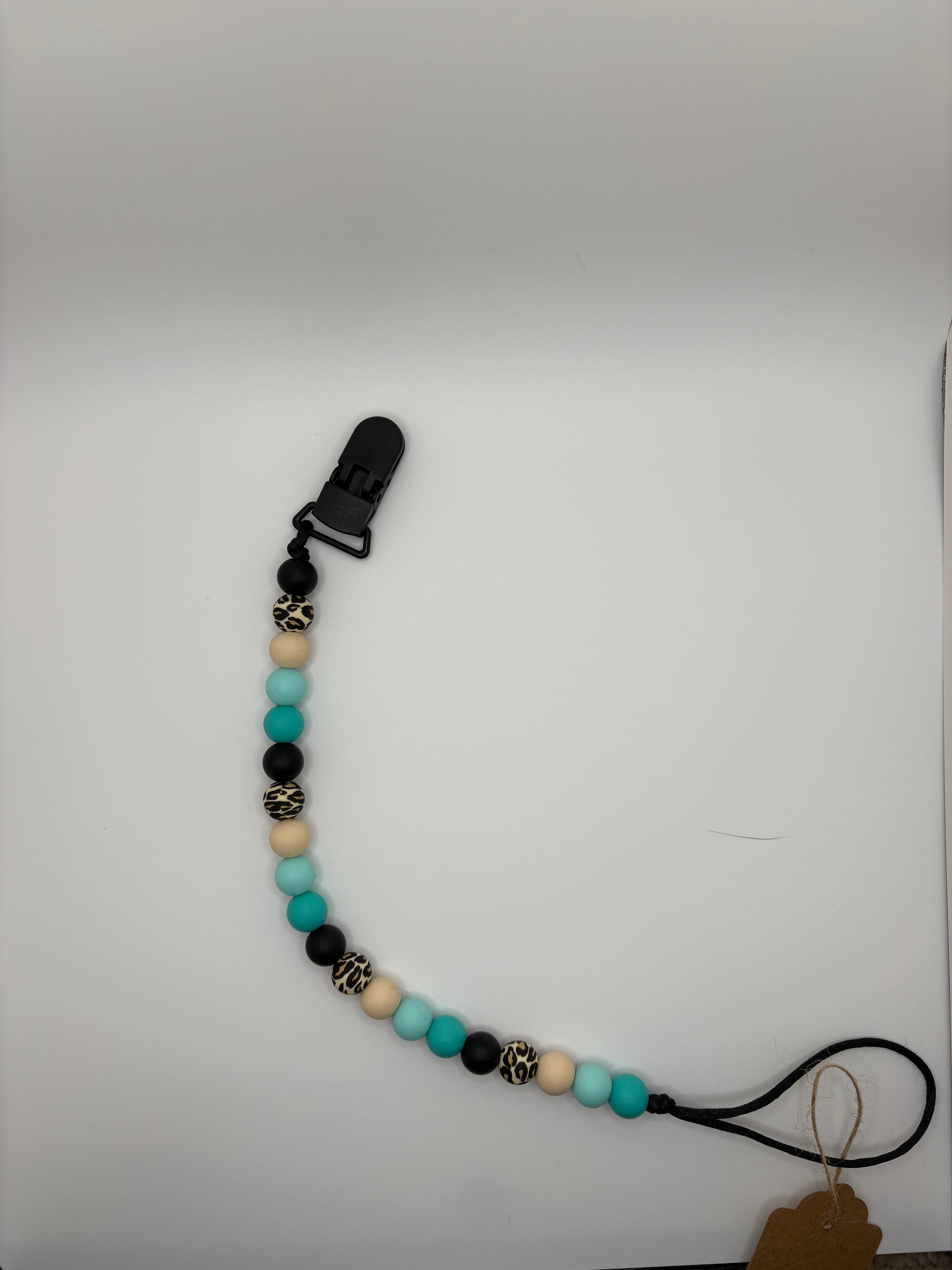 teal cheetah print binky clip