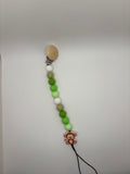 green monkey binky clip