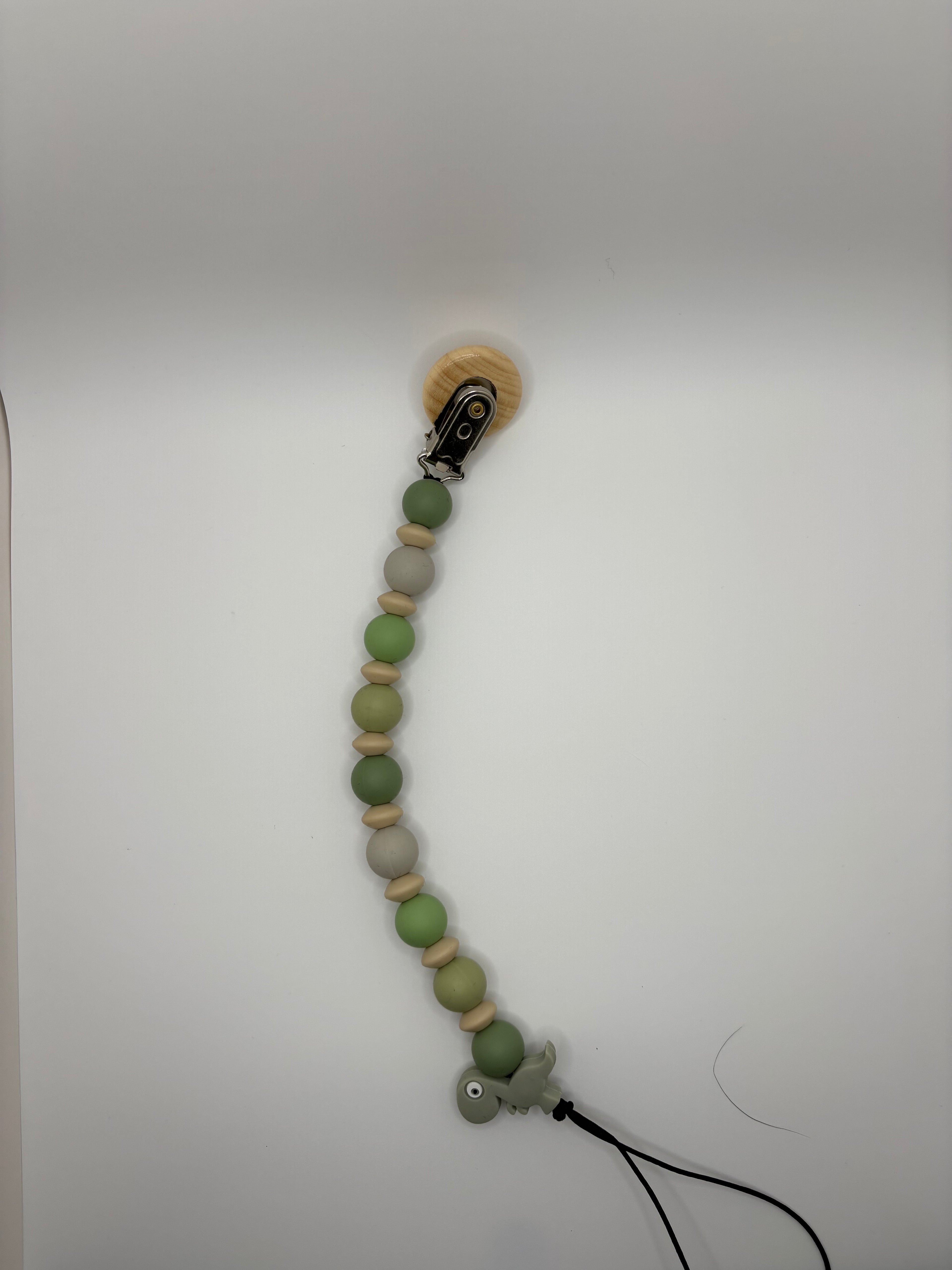 green Dino binky clip