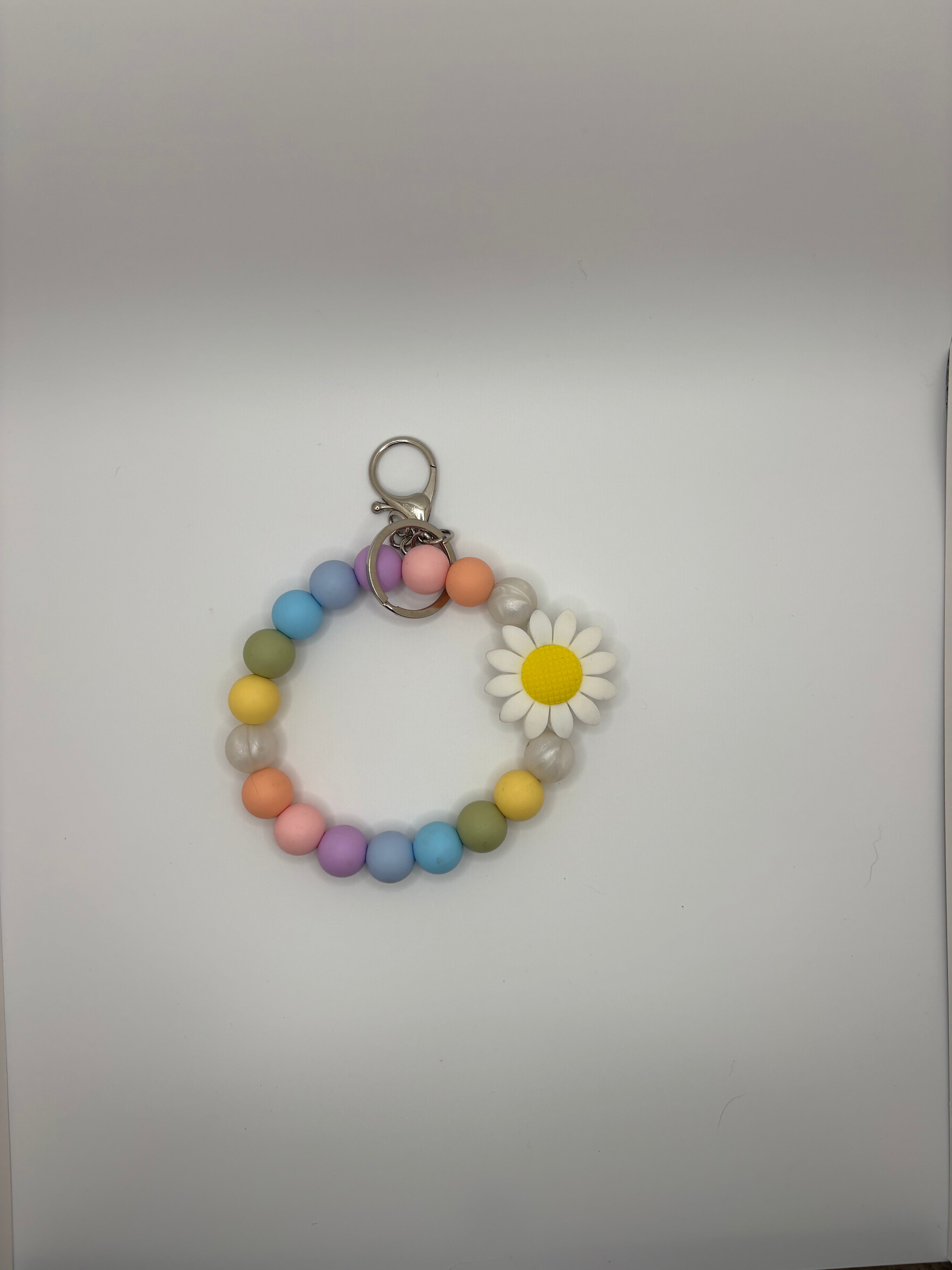 colorful daisy wristlet